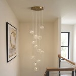 Oslo - Brushed Aged Brass 12 Light Cluster Pendant with Clear Glass