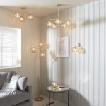 Dimple - Brushed Brass Wall Lamp with Amber Glass Dimple - Brushed Brass Wall Lamp with Amber Glass