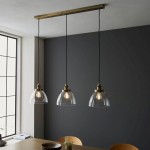 Hansen - Antique Brass 3 Light over Island Fitting with Clear Glasses Hansen - Antique Brass 3 Light over Island Fitting with Clear Glasses