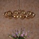 Dar-OPH1235 - Ophira - Antique Gold 12 Light Centre Fitting with Amber Ribbed Glass