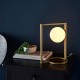 Ambience-63766 - Vassilios - Brushed Gold Table Lamp with White Glasses