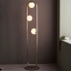 Ambience-63769 - Vassilios - Brushed Silver 3 Light Floor Lamp with White Glasses